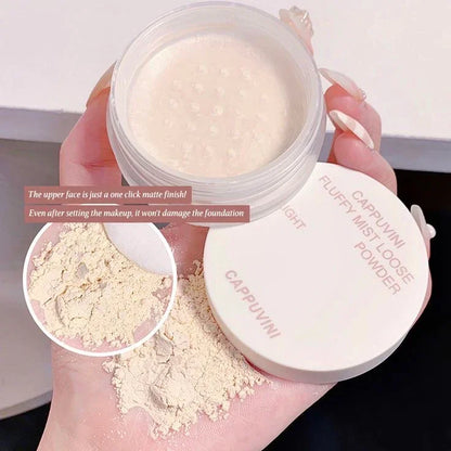Polvo suelto matificante coreano CAPPUVINI para maquillaje, textura ligera, color beige claro.