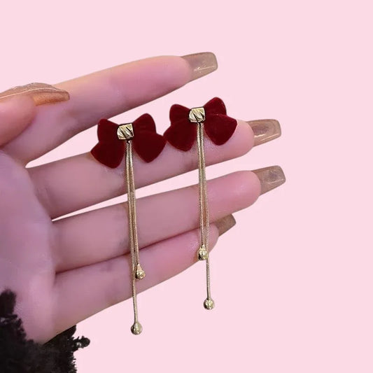 aretes largos dorados con lazo rojo para mujer, accesorios de moda coreana